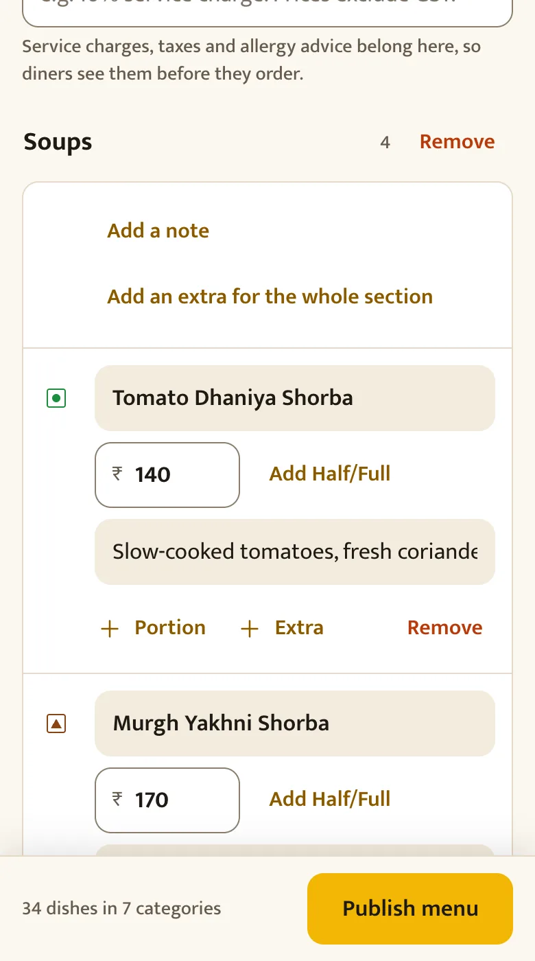 The check screen on a phone, listing each dish with its veg mark, name, price and description, ready to edit.