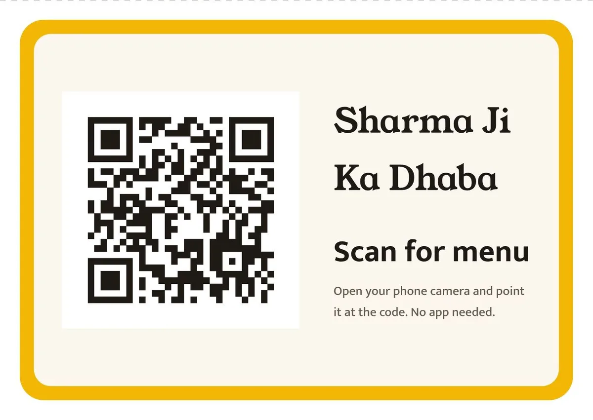 A printed table tent with the restaurant name, a QR code and the words Scan for menu.